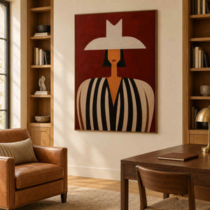 Modern portrait wall art in a study with a wood-tone frame