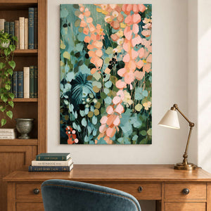 Cascading peach and blush leaves against deep green foliage without an outer frame, displayed in a home office.