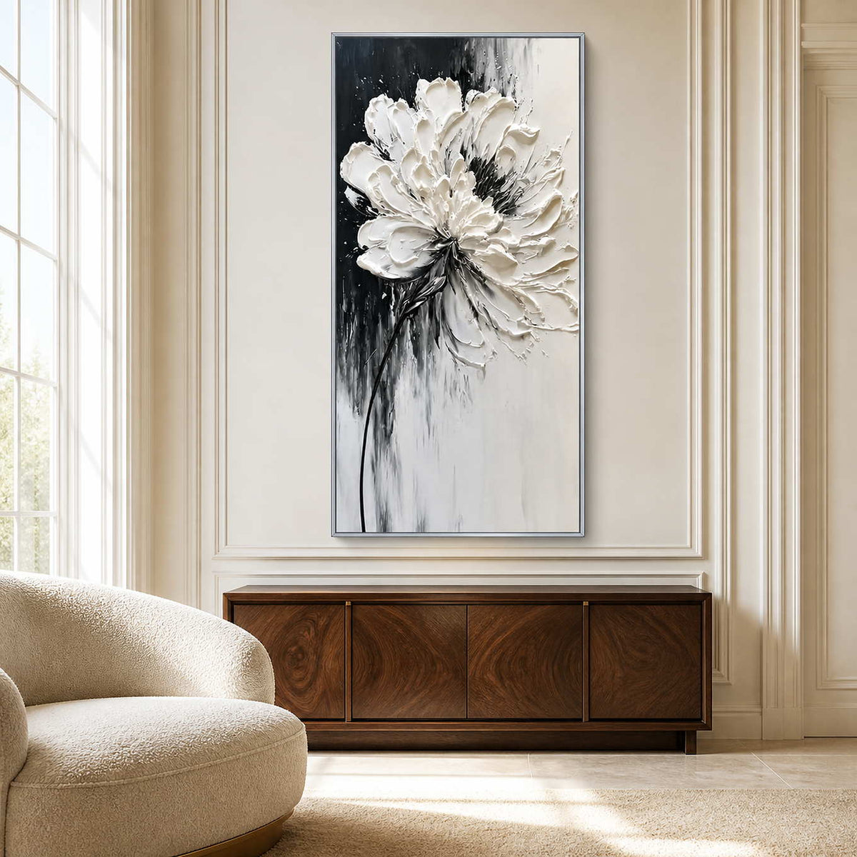 Silver framed white floral artwork above a walnut sideboard in a sitting room.