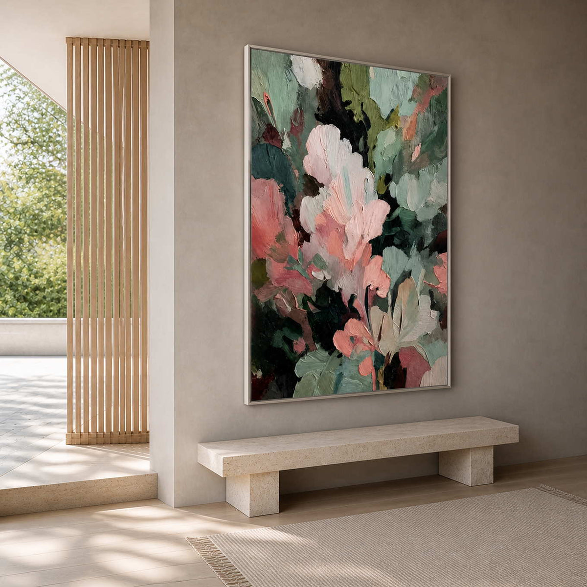 Silver framed garden inspired abstract painting above a stone bench in a bright entryway.
