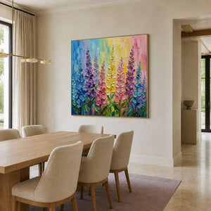 Bright botanical artwork displayed above a light wood contemporary dining room.