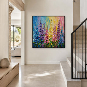 Multicolor flower canvas displayed beside a warm white residential staircase.