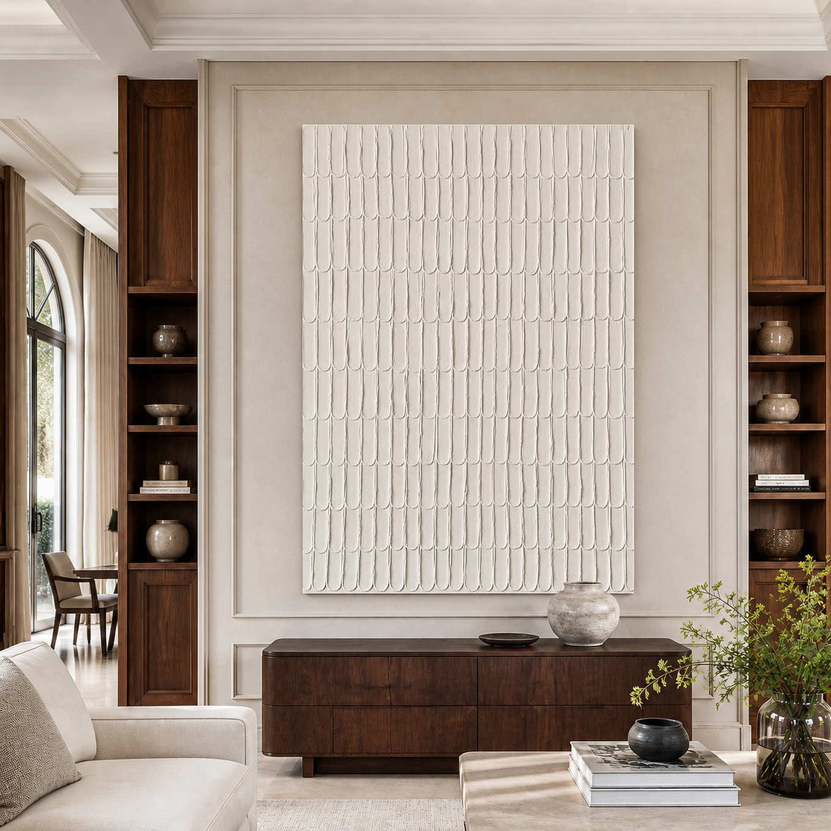 Frameless cream textured artwork above a dark wooden cabinet in a bright living room.