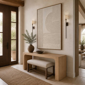 Wood framed parallel groove painting above an entry console and upholstered bench.