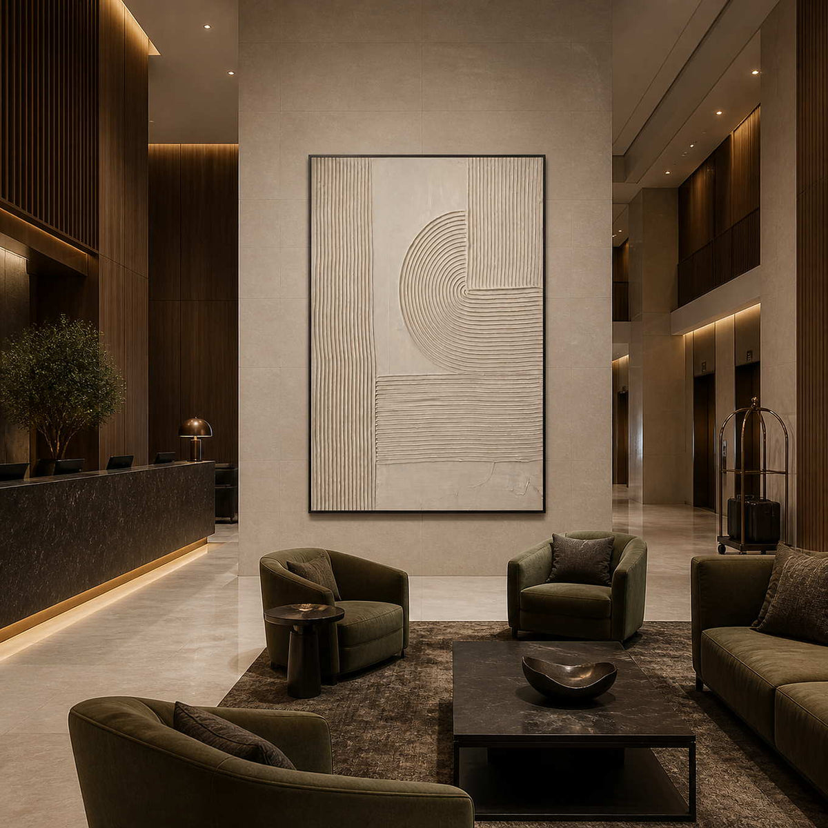 Black framed curved relief panel beside a hotel reception desk and lounge seating.