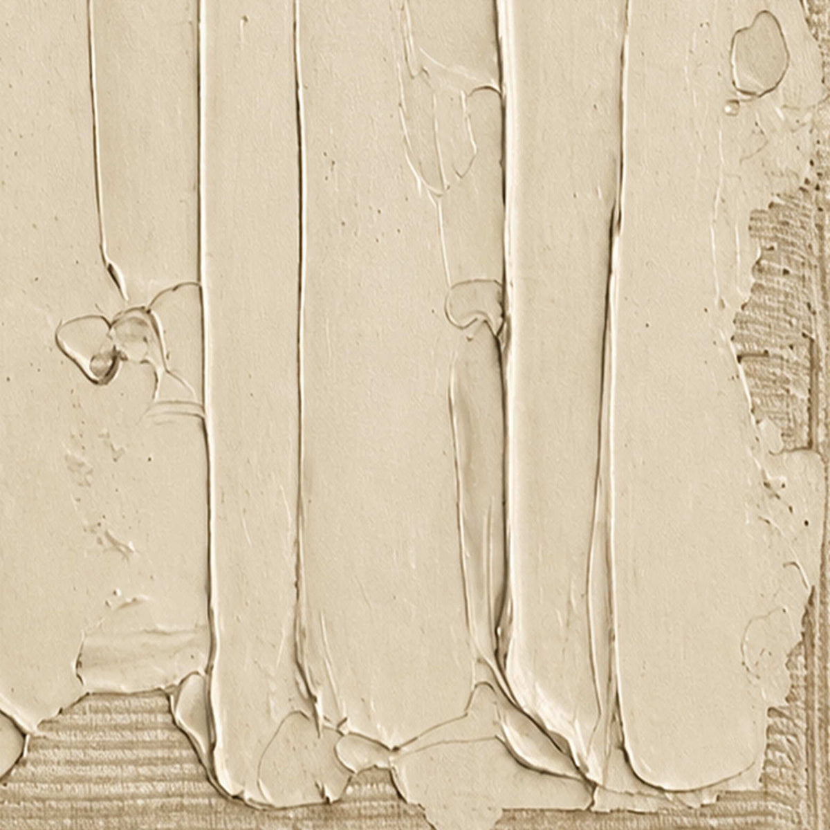 Close view of raised cream strokes, small surface pits and ridged edges.