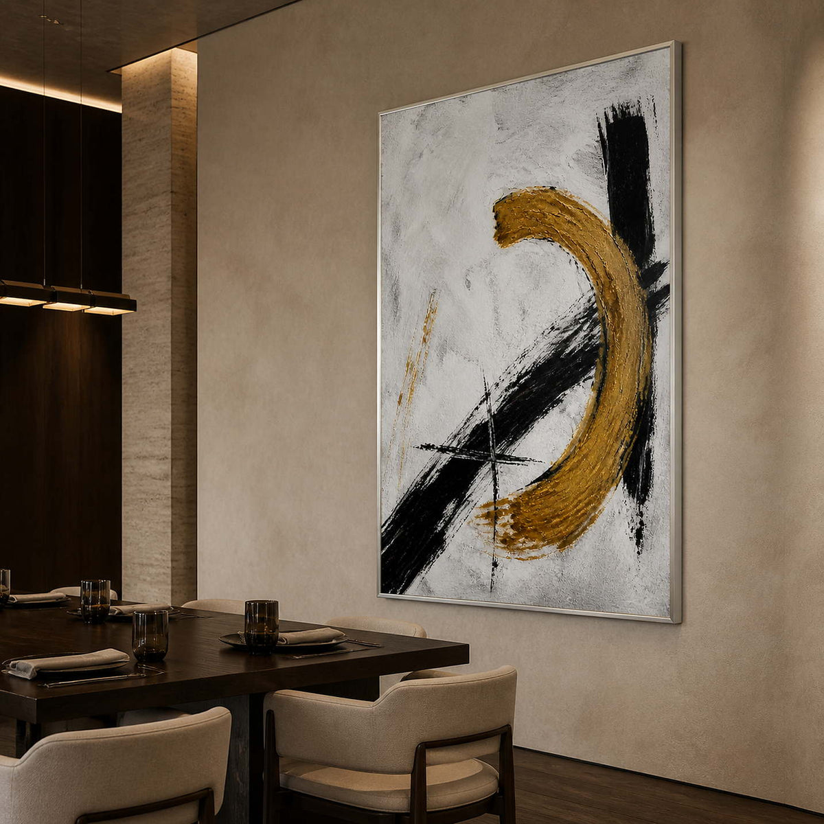 Black and gold textured wall art displayed in a designer dining room.