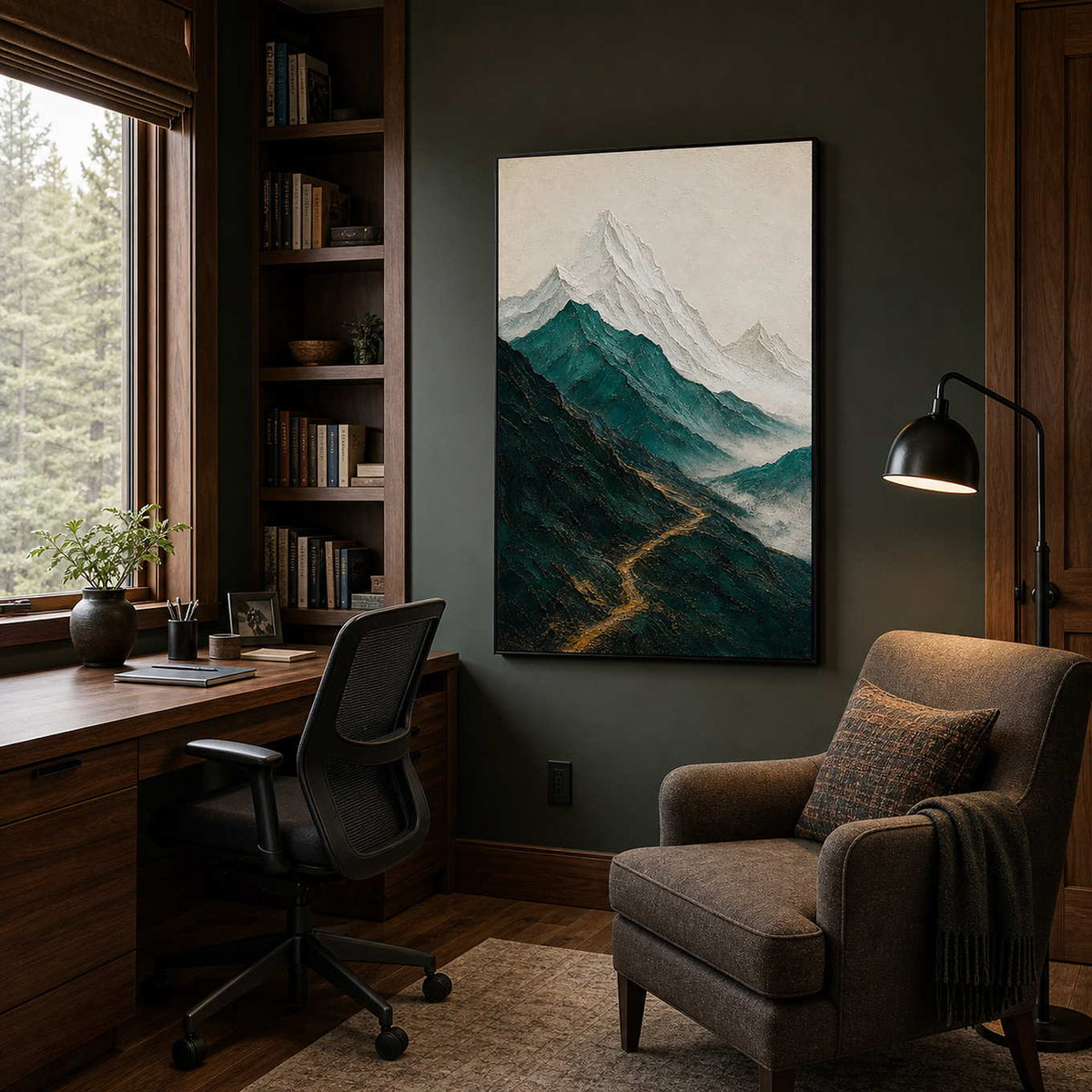 Textured mountain wall art displayed in a dark wood home office.