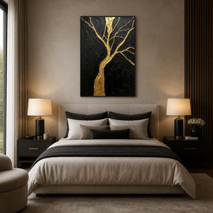 Dramatic gold tree wall art displayed above a refined neutral bedroom.