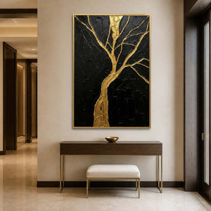 Vertical gold tree painting displayed above a modern entryway console.