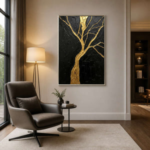 Textured tree artwork displayed beside a contemporary reading chair.