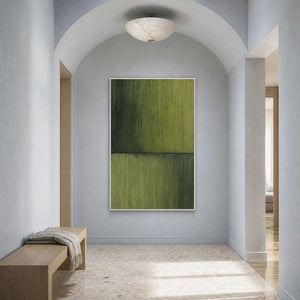 Quiet olive abstract canvas in a mist-blue arched entryway.