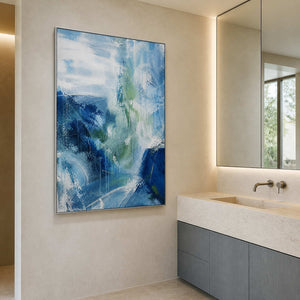 Misty blue textured artwork in a refined contemporary bathroom.