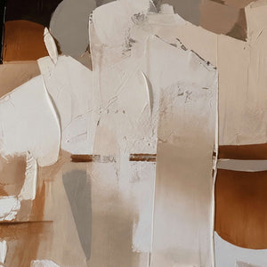 Close view of layered cream strokes and raised edges over brown and charcoal.