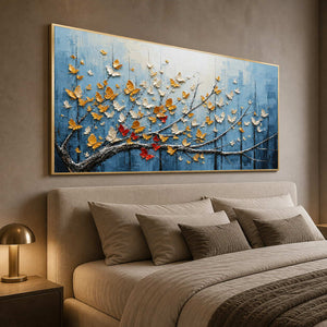 Gold and ivory butterfly artwork shown in a luxury primary bedroom.