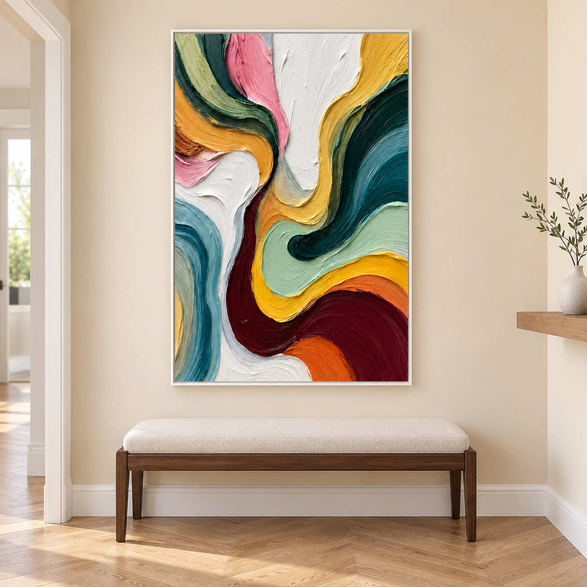 White-framed vertical abstract over an upholstered entry bench.