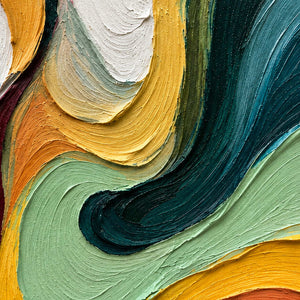 Close-up of nested white, yellow, mint, and deep teal ridges.