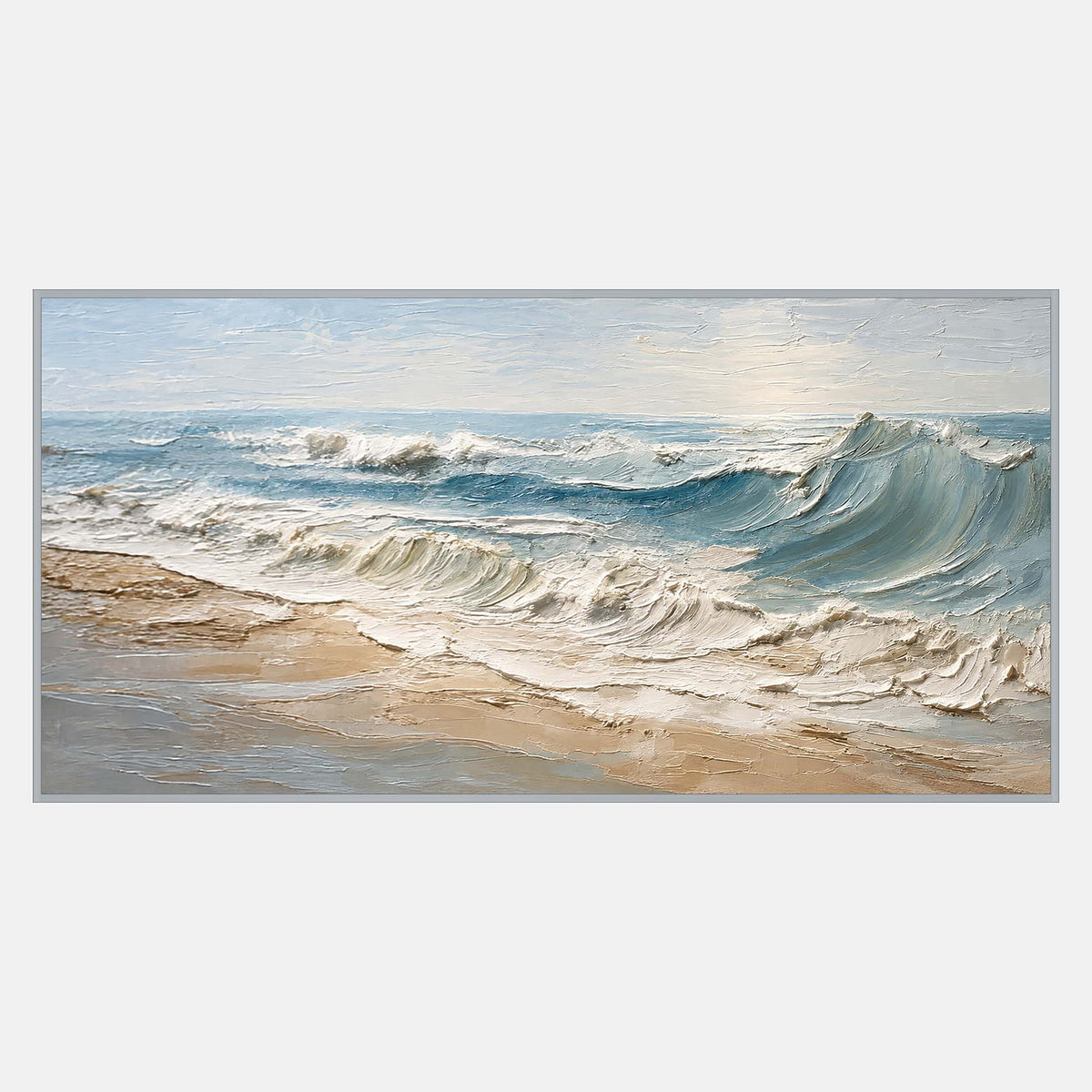 Wide seascape with blue-gray breaking waves, cream foam, and a pale sandy shore running diagonally across the foreground.