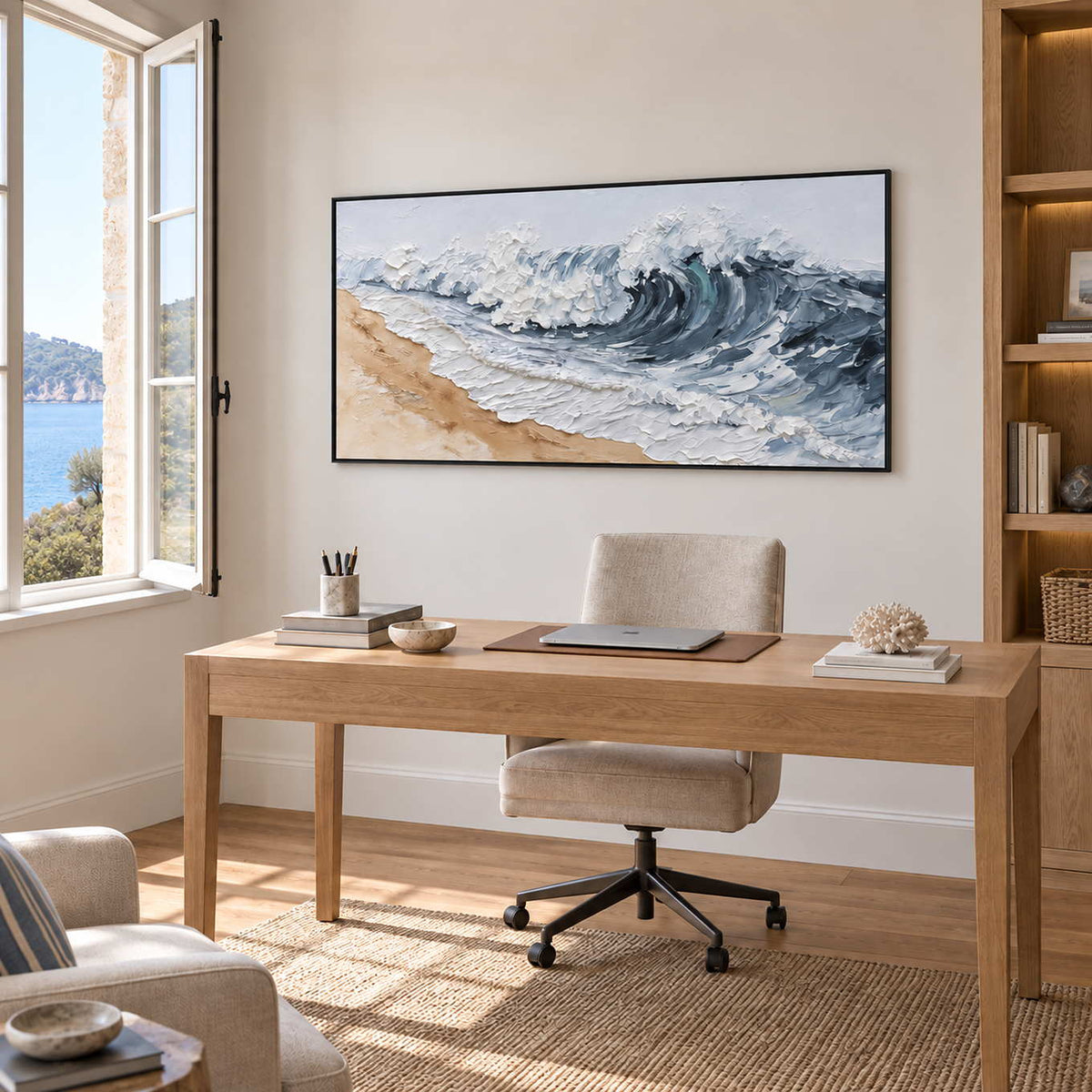A Letter from the Waves in a black frame above a light wood desk beside an open window.