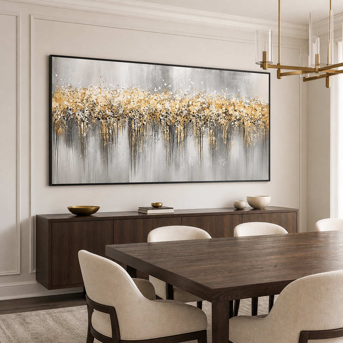 Black framed gold and gray abstract painting beside a dark wooden dining table.