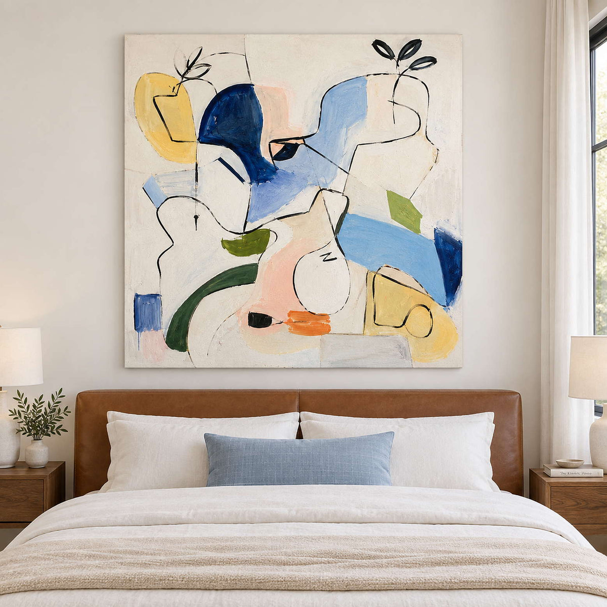 Loose black outlines and blue, yellow and green abstract shapes without an outer frame, displayed above a bed.