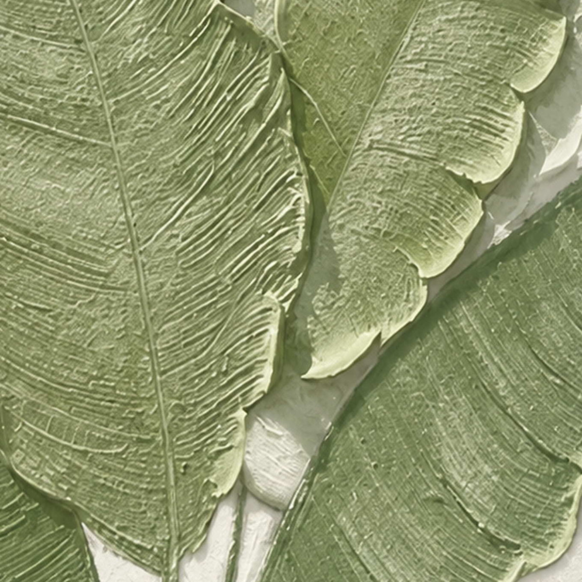 Close-up of raised green leaf veins and fine ridges against a pale background.
