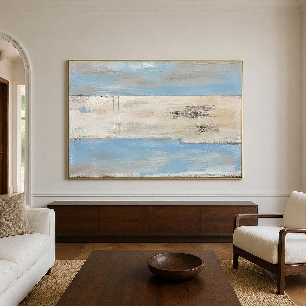 Pale blue, ivory, and sand minimalist coastal wall art in a neutral living room.