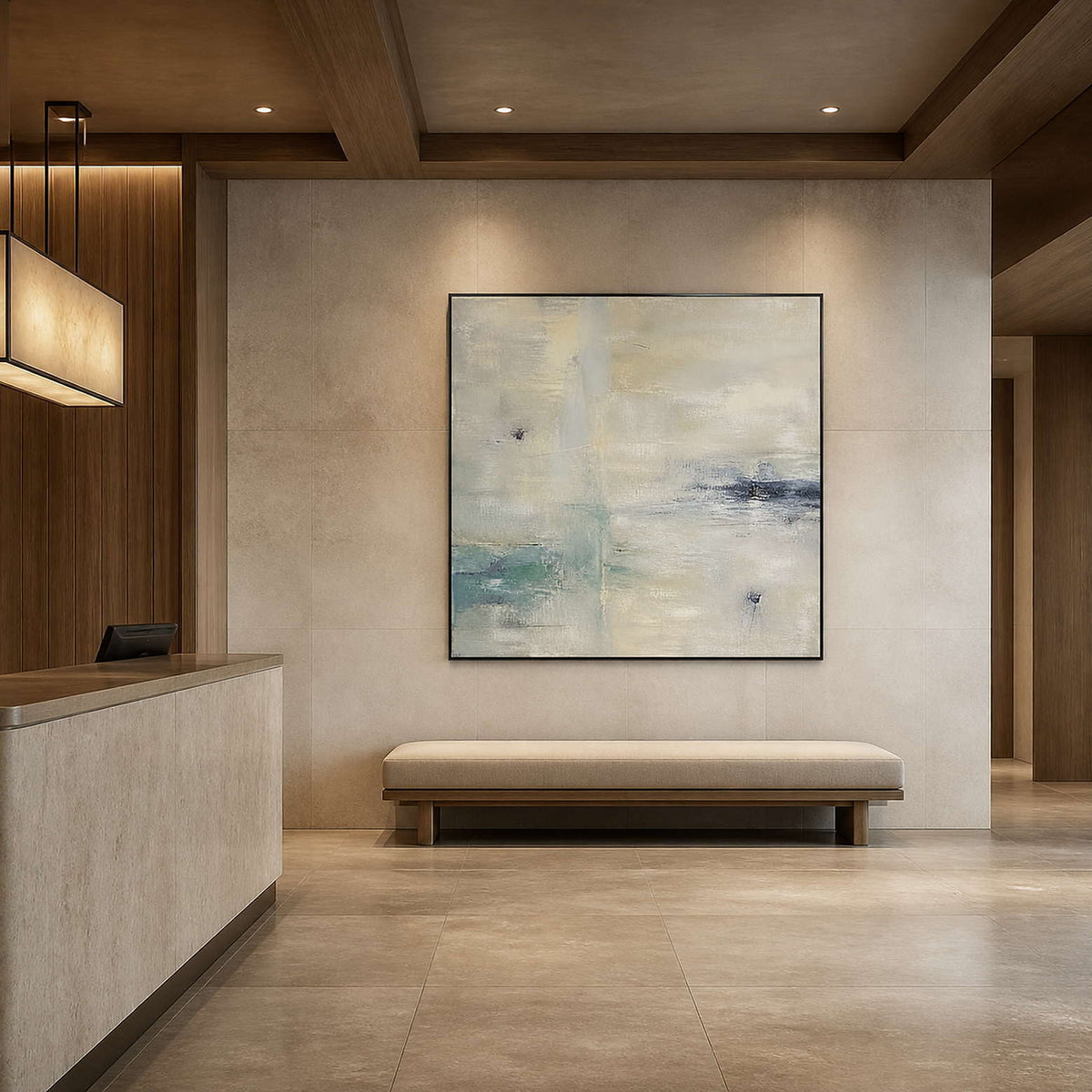 Large neutral abstract wall art in a warm contemporary hotel lobby.