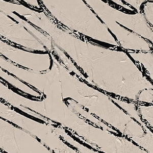 Detail of broken black looping marks crossing the raised pale painted surface.