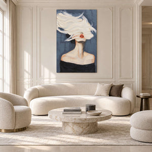 White-swept portrait above a curved cream sofa in a paneled living room.