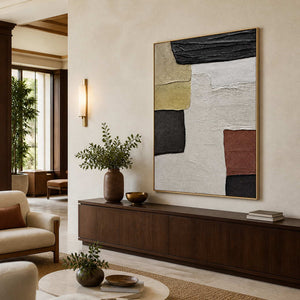 A Pause in the Afternoon in a gold frame above a long walnut cabinet beside neutral hotel lounge seating.