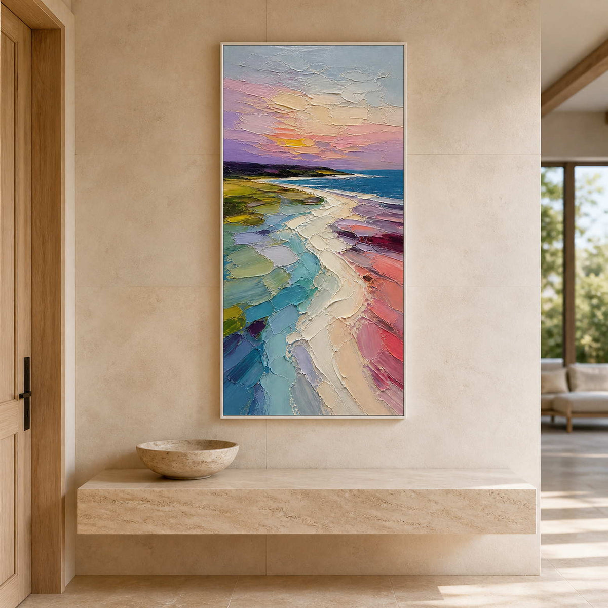 Tall colorful coastal artwork displayed above a stone entryway console.