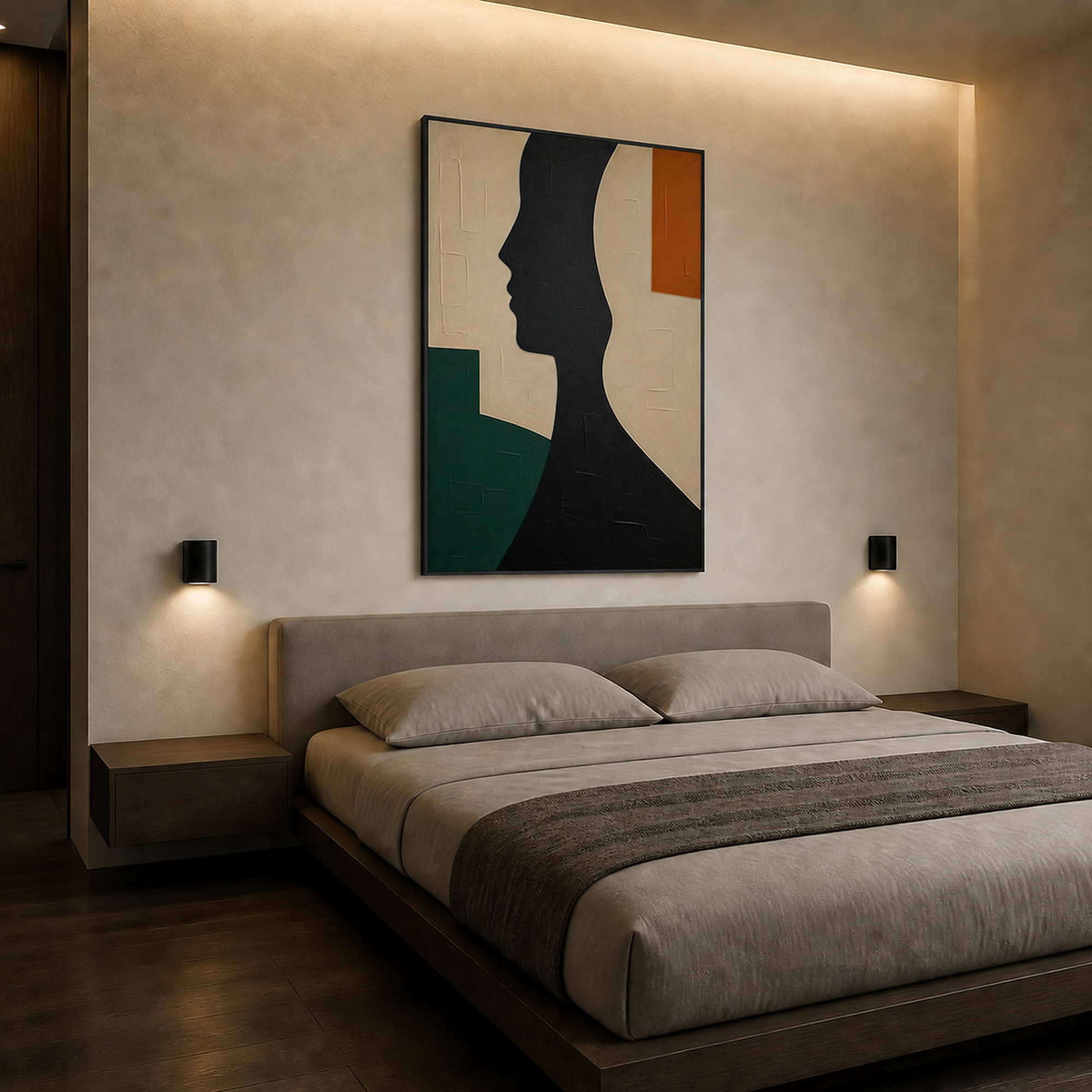 Black silhouette wall art adding structure to a warm modern bedroom.