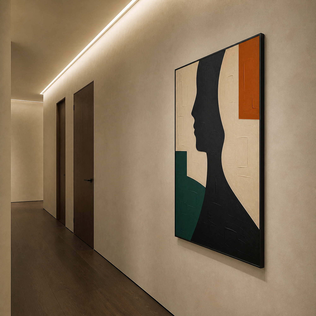 Black and green portrait canvas viewed along a contemporary hallway.