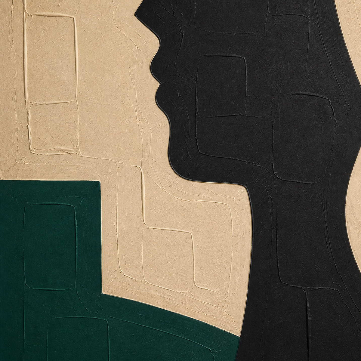 Close-up of black profile relief, ivory texture, and deep green paint.