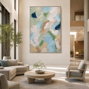 Soft vertical abstract wall art displayed in a spacious hotel lobby.