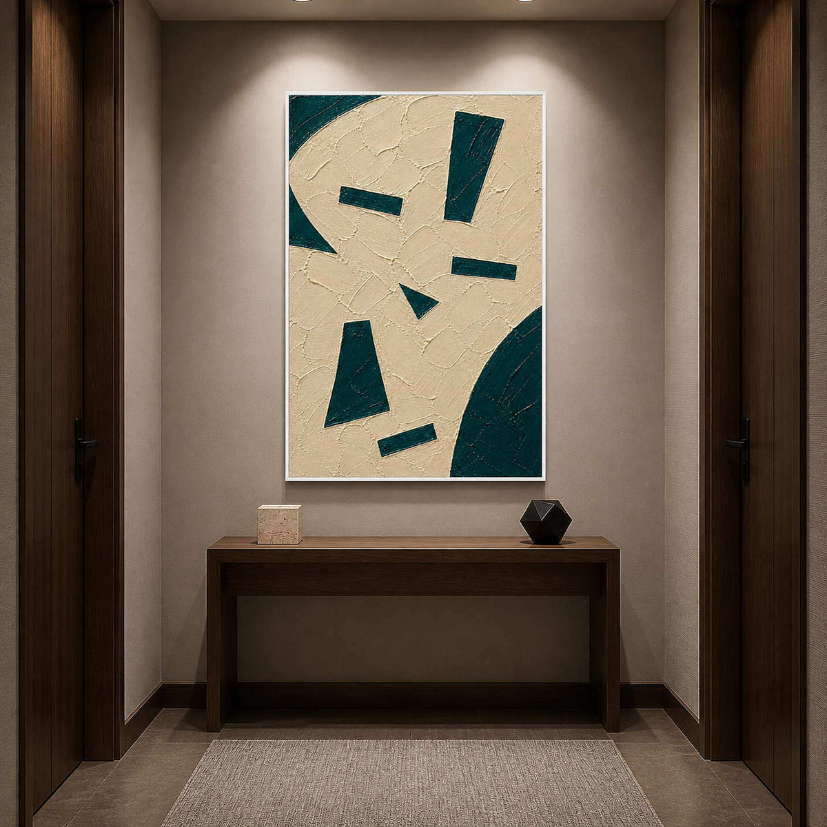 Minimal textured abstract art displayed in a dark hotel hallway.