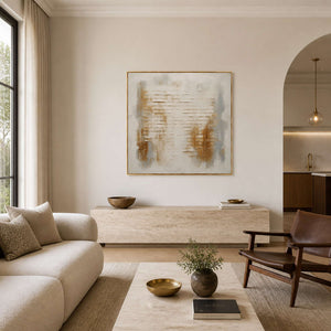 Textured abstract wall art displayed in a warm modern living room.