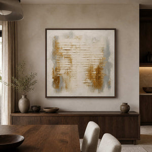 Ivory and gold abstract wall art displayed in a walnut dining room.