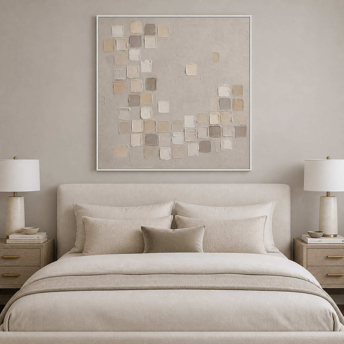 Calming ivory and taupe wall art above a serene bedroom with a white frame.