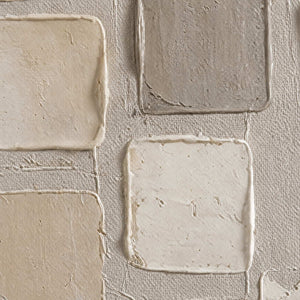 Close-up of raised ivory and taupe palette-knife squares on textured canvas.