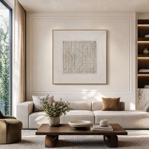 Neutral textured wall art styled in a living room.
