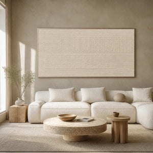 Ivory textured minimalist wall art in a warm contemporary living room.