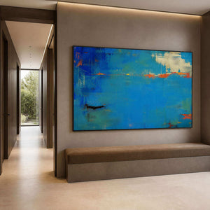 Horizontal cobalt artwork displayed along a refined modern hallway.