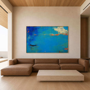 Bright blue textured abstract wall art in a modern living room.
