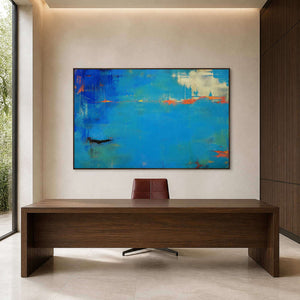 Expansive blue wall art creating focus in a wood office.