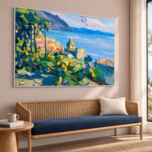 Angled bay artwork above a woven settee with a navy cushion.
