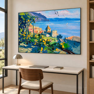 Seaside landscape above a white desk and wooden chair.