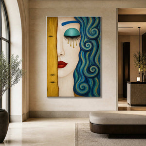 Textured portrait wall art displayed in a refined boutique hotel entryway.