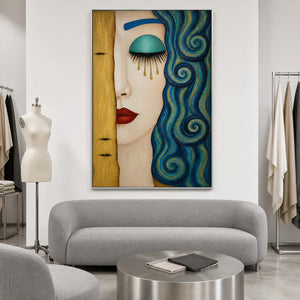 Textured portrait wall art displayed in a refined fashion studio lounge.